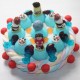 Gâteau d'anniversaire en bonbons footballeurs