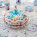 La Reine des Neiges sur un gâteau de bonbons